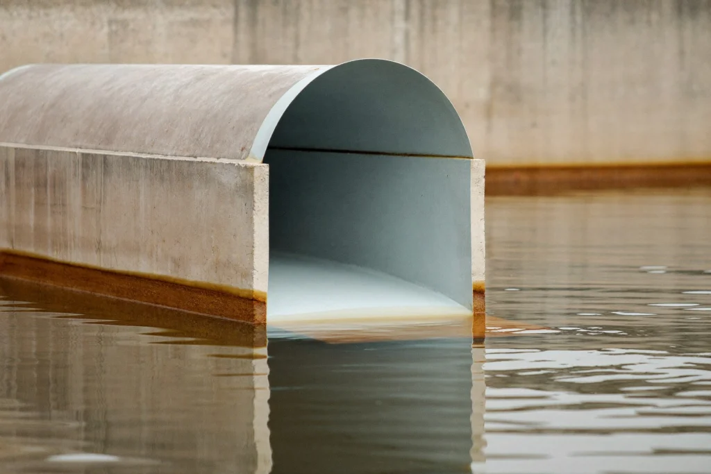 Protective coating lining a concrete channel at a water treatment plant
